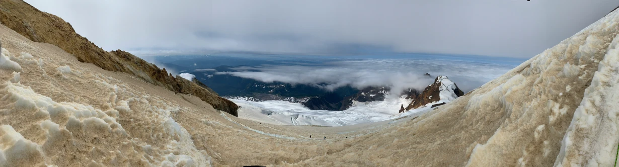 an aerial view of a mountain from high up