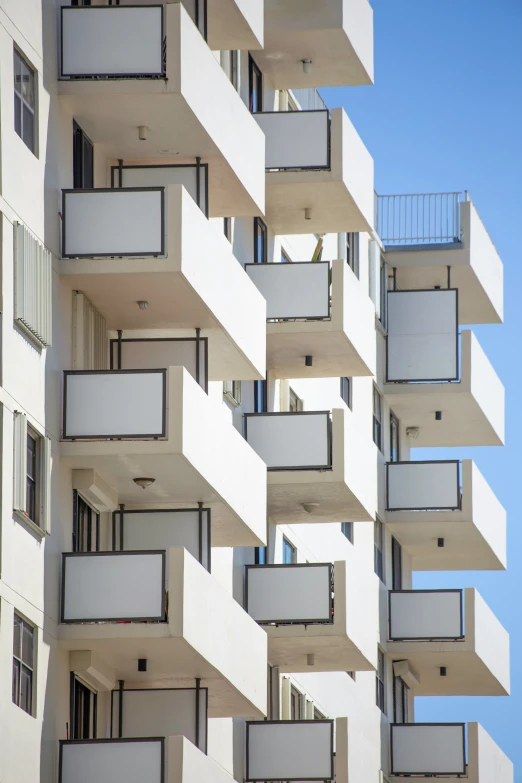 a very tall building with some balconies attached to it