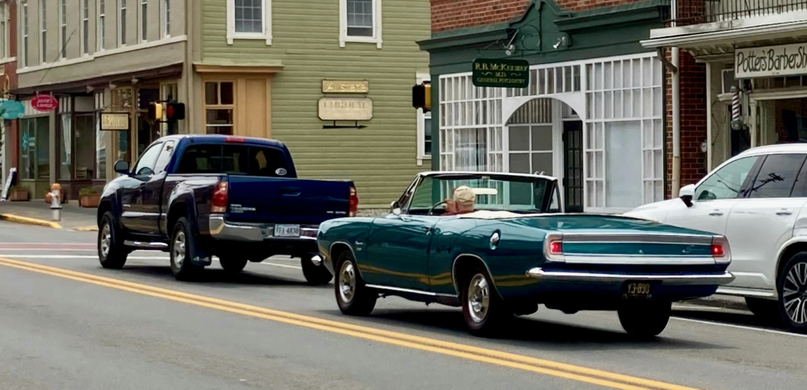 two trucks parked in front of each other