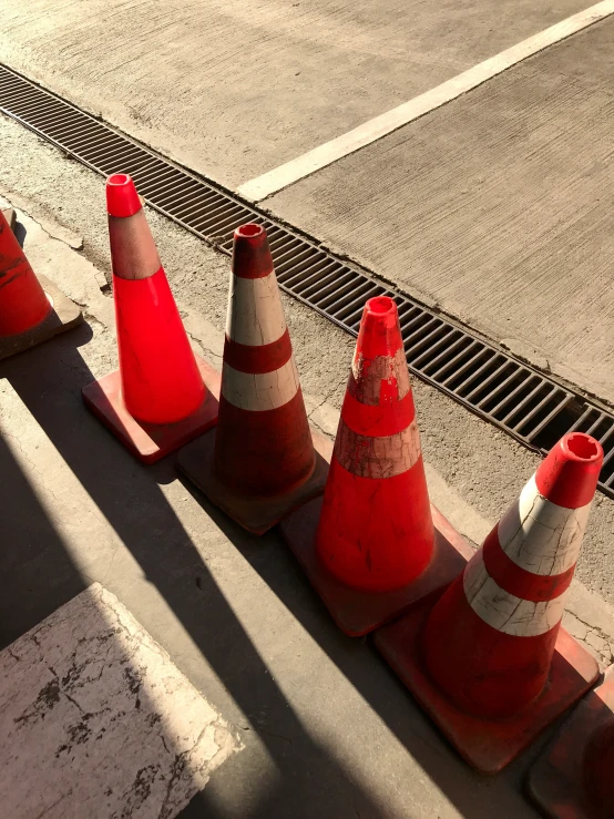 traffic cones sitting in the middle of the road