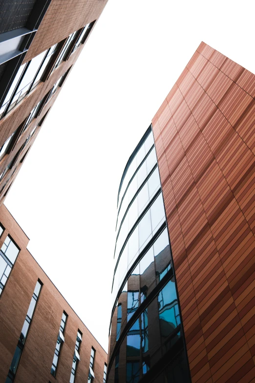 a building with an upward view of some of it's windows