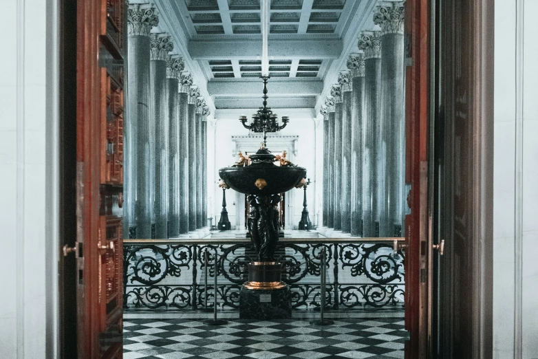 the inside of a room with an intricate balcony