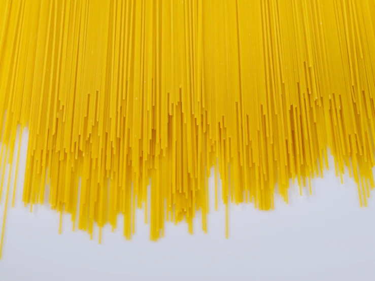 a yellow piece of string hanging from the side