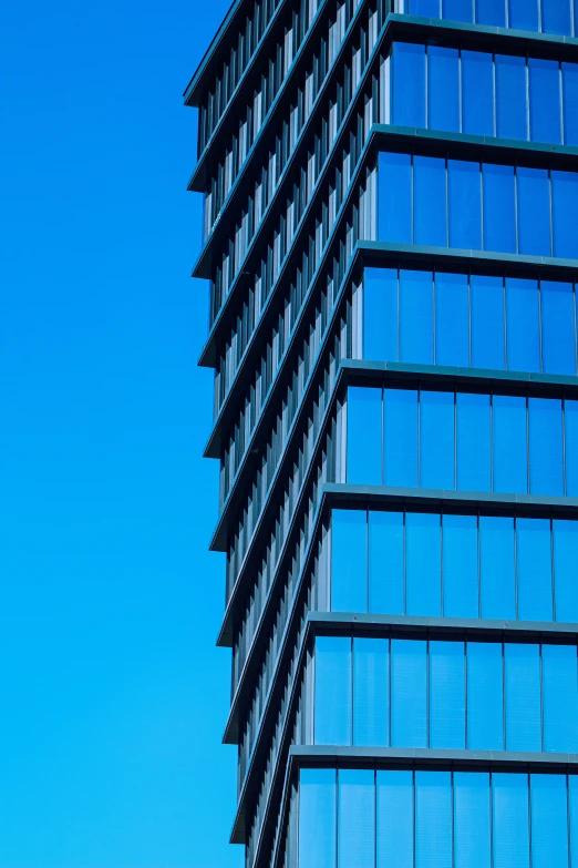 an image of a tall building that looks out into the sky