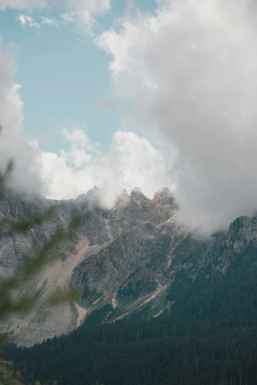 a mountain is seen during the cloudy day