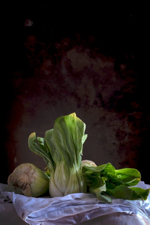 a table with an old fashioned vegetable and a knife