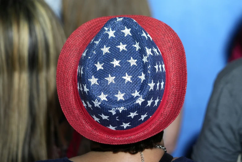 a woman with an american hat on her head