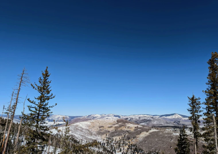 the snowy mountains of the western united states on a sunny day