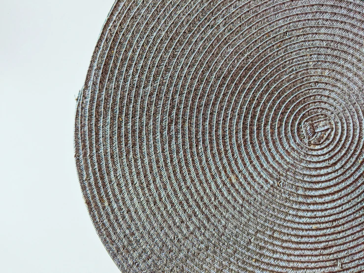 circular woven piece of woven material with no color