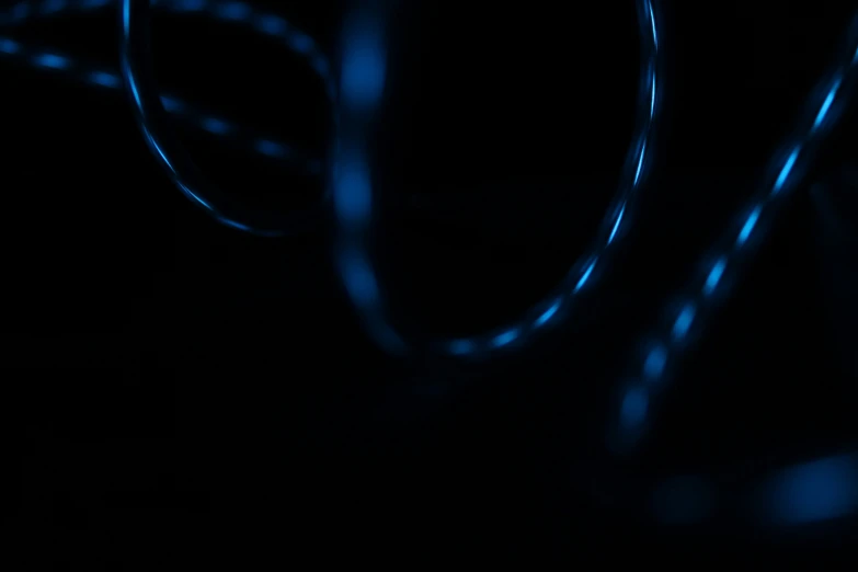 blue light streaks in a dark room