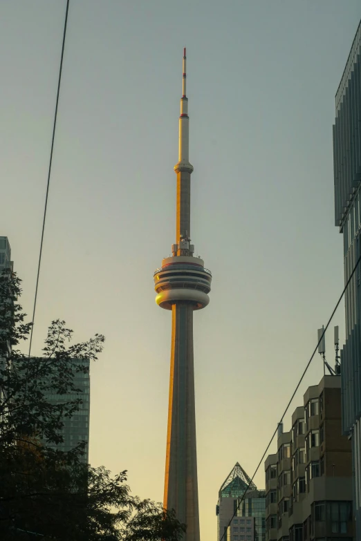 a tall tower is seen in the distance