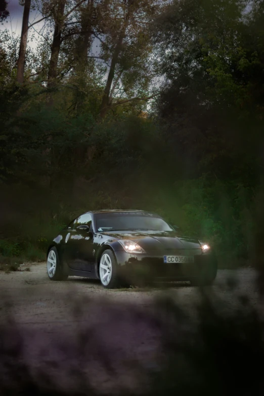 a car driving on the road at night time