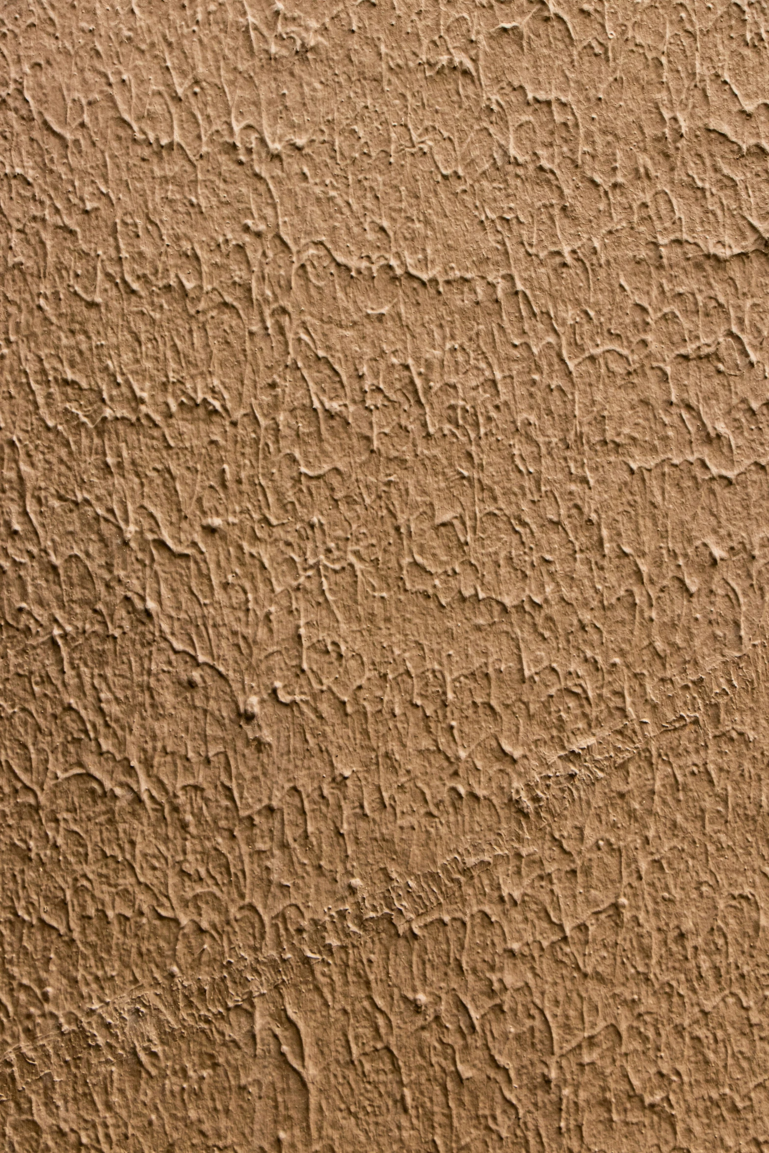 a stucco background with some kind of pattern