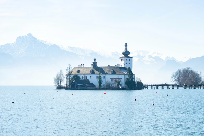 a church is located in the middle of a lake