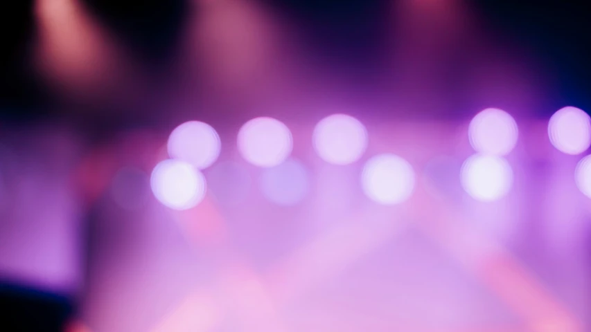 blurry stage lights with purple spotlights