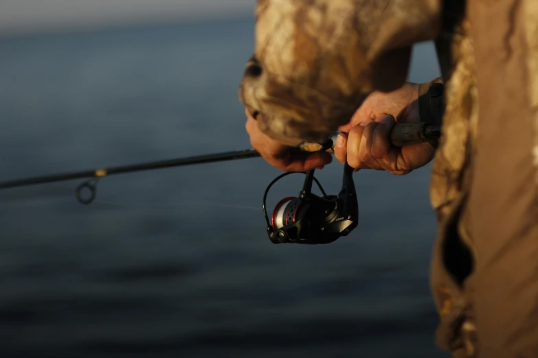 a person holding onto a fishing rod and some very nice things