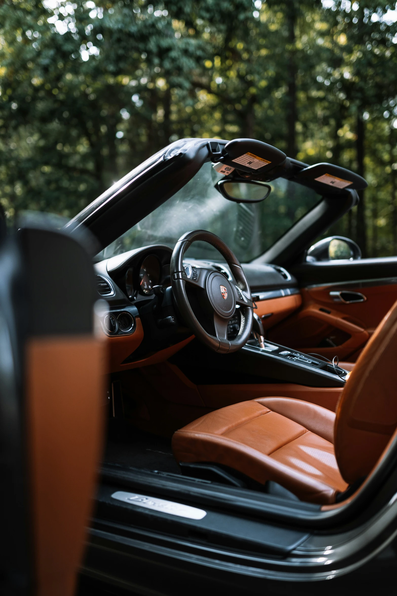 a driver's view from inside a convertible car