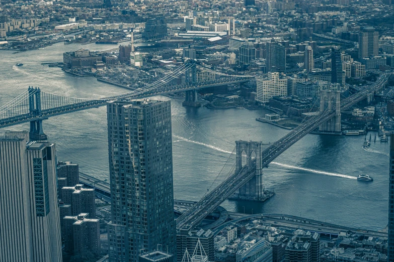 a cityscape with tall buildings overlooking the water