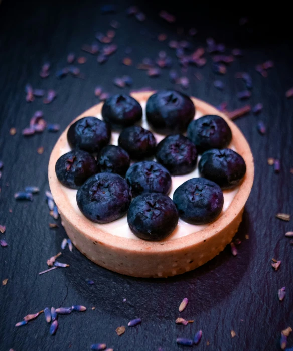 a dessert dish is filled with chocolate chip cookie dough and fruit