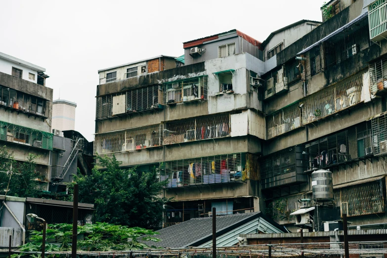 an old abandoned looking building with balcony balconies