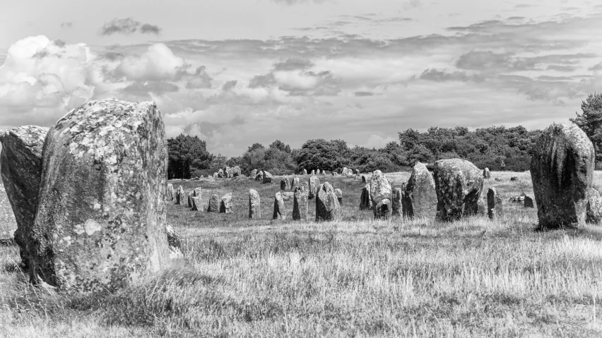 black and white pograph of old graves in a field