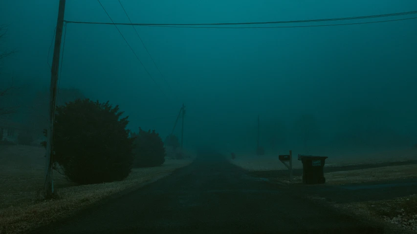 an image of a road going dark at night