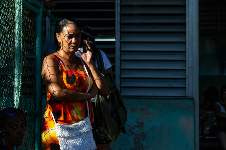 a woman is talking on her cell phone