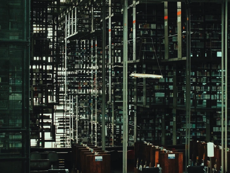 a bunch of empty metal shelves in a room