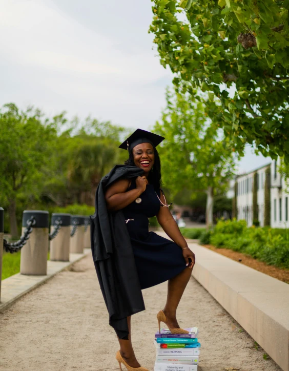 a female student is posing for a pograph