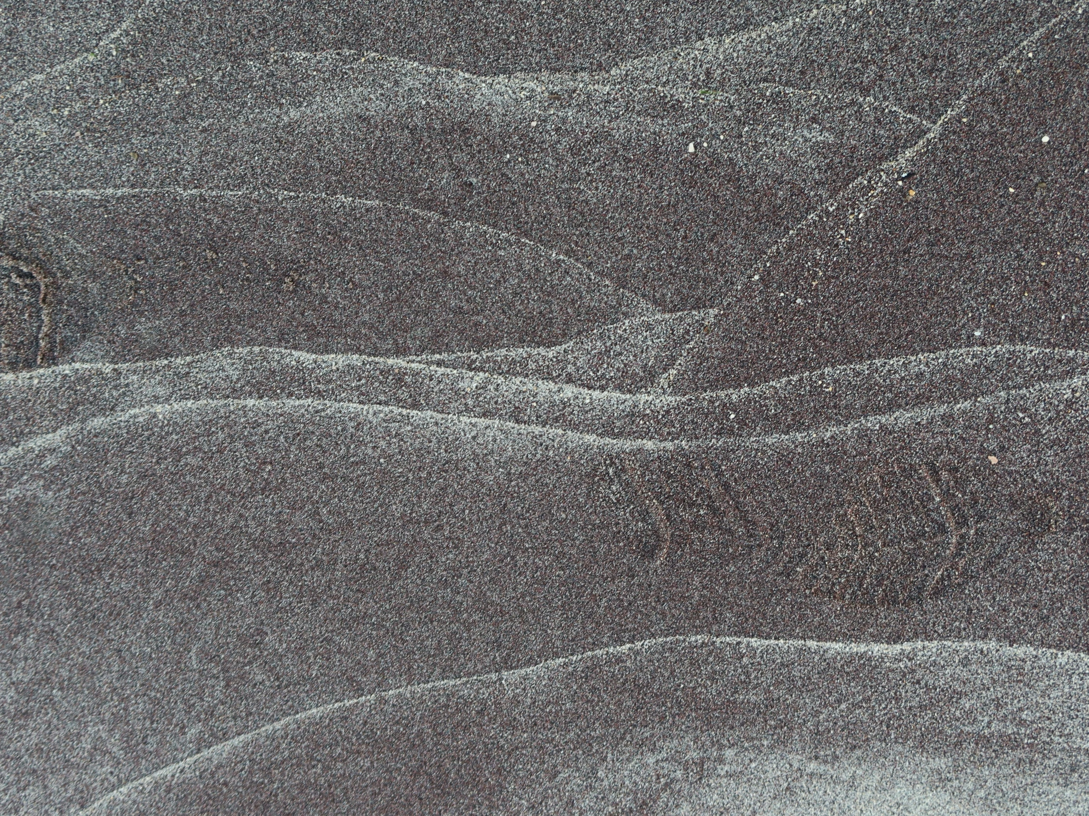 a closeup of the sand patterns