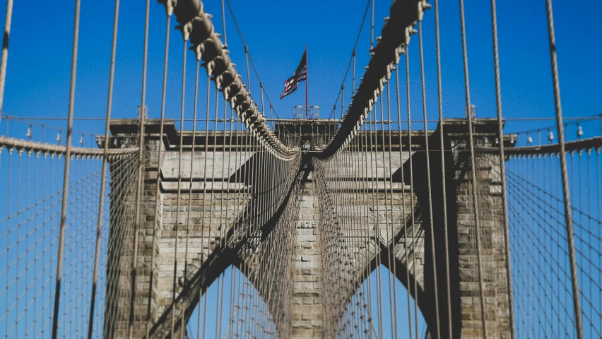 the view of the cables on the top of the brooklyn bridge