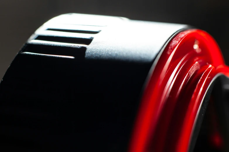 the red tube of a car is shown on a gray background