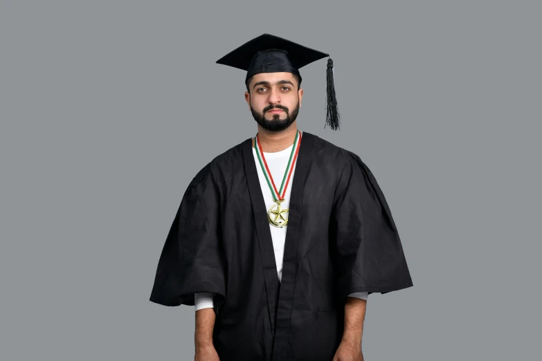 a man in cap and gown standing