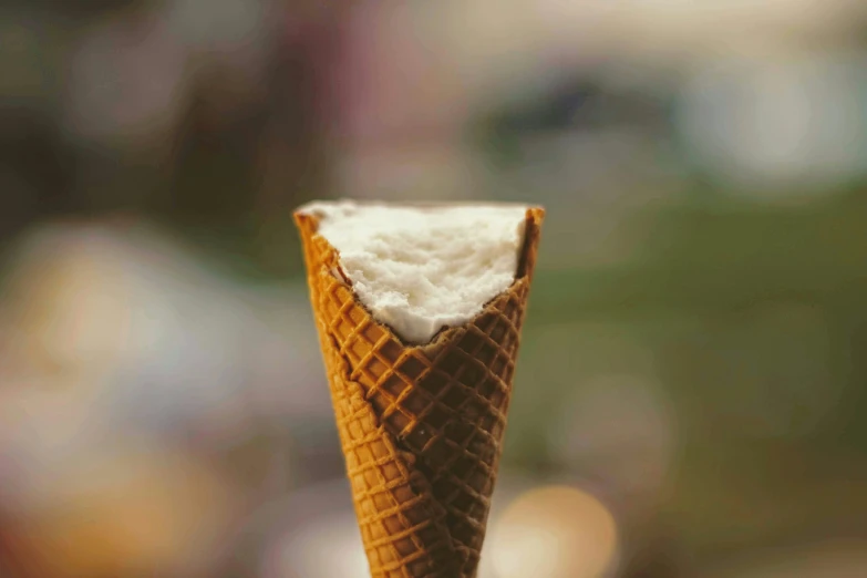 an ice cream cone with the tip out