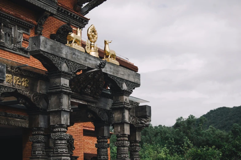 a building with some statues atop it