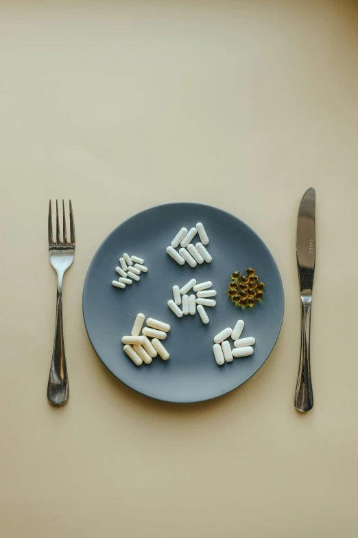 a plate with different type of food on it and silverware