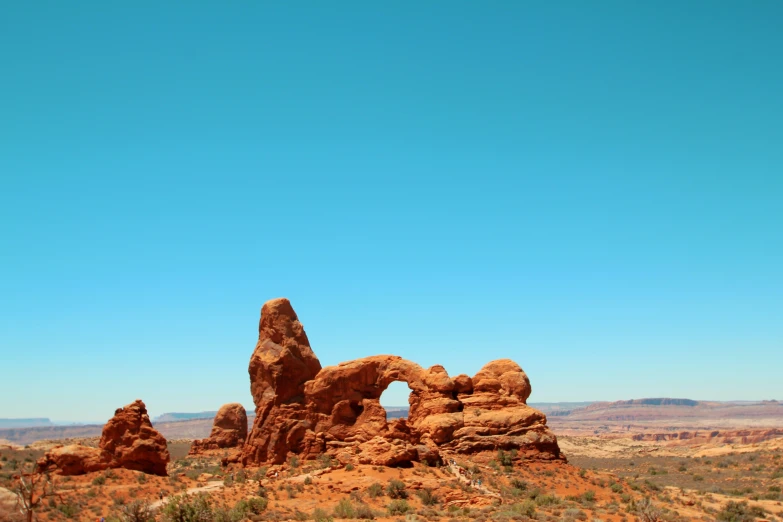 a large rock formation in the desert