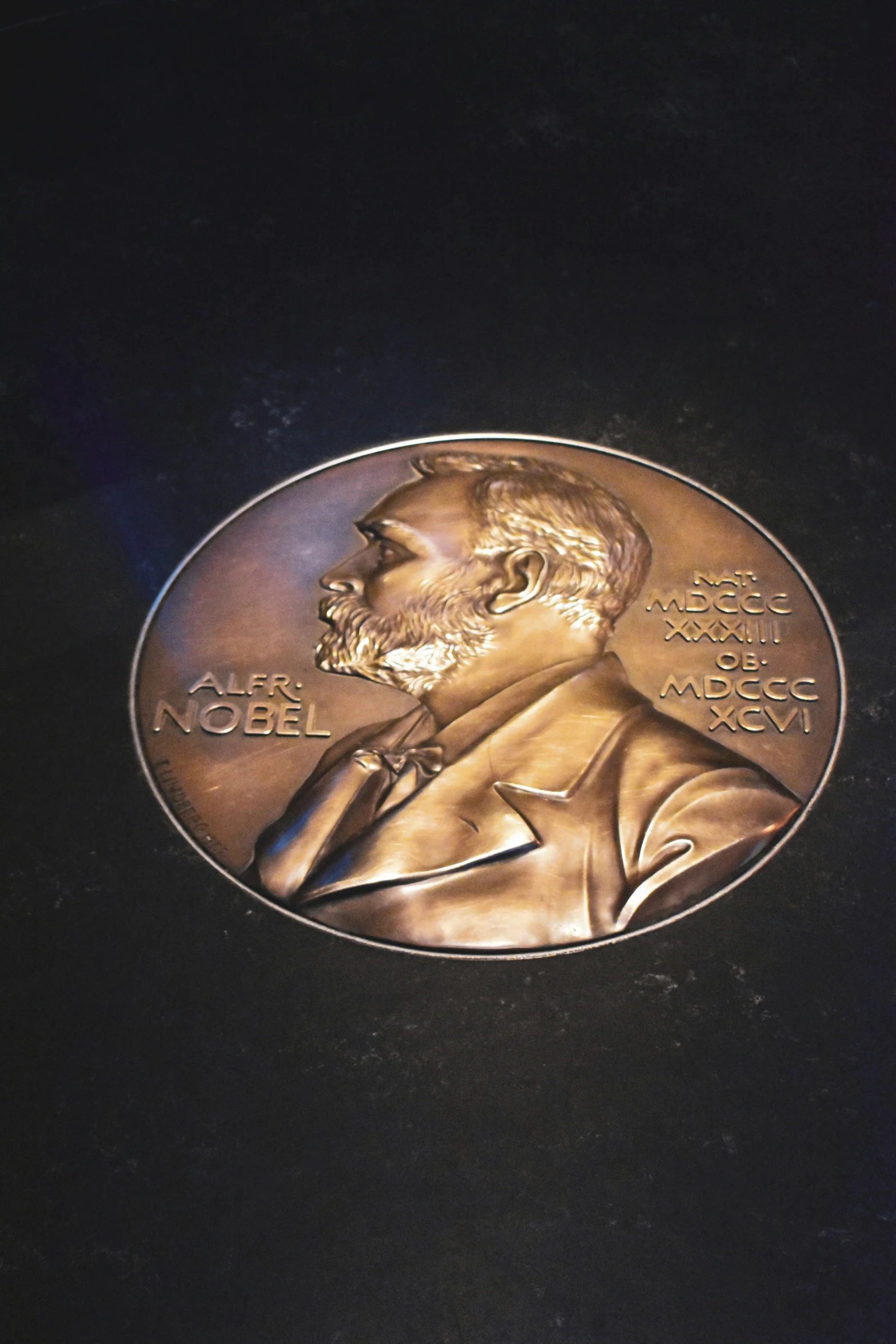 a portrait of aham lincoln is on a metal coin