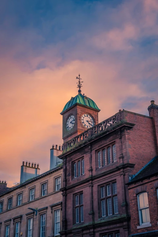 an old building with a clock on top