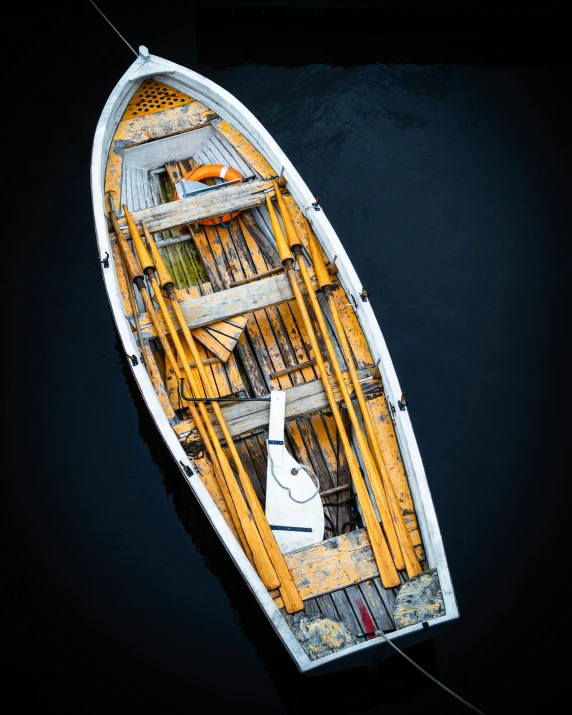 an overhead view of a boat tied to a rope