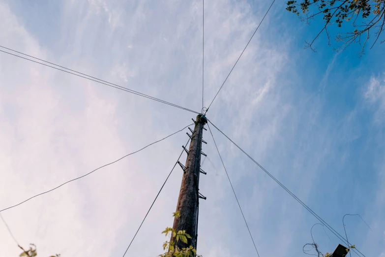 the antenna of an old tower with wires connected to it