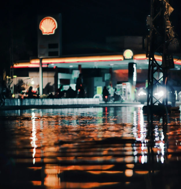 a po of some lights and reflections of water