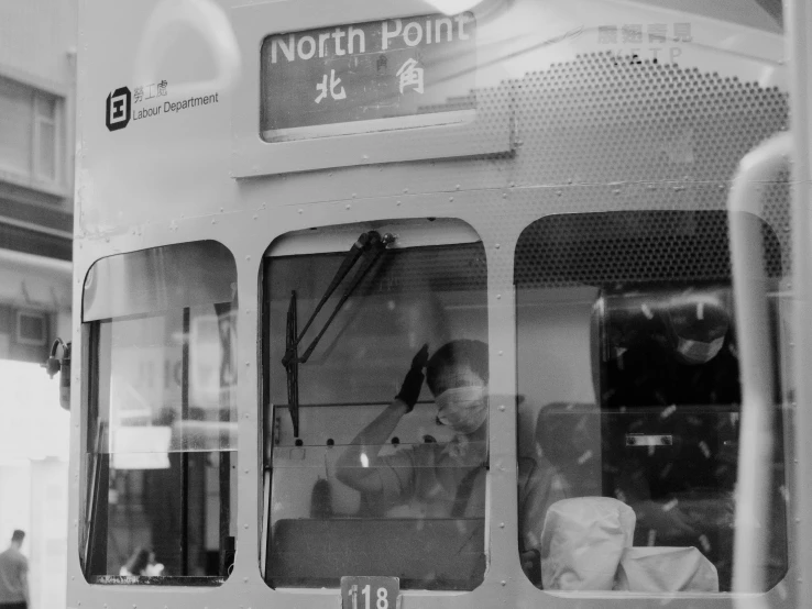 a black and white po of a train car at night