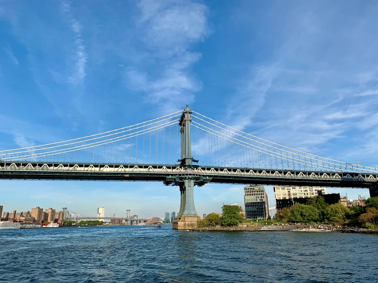 an elevated bridge spanning the width of an open river