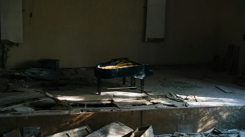 an old piano sits in a run down room