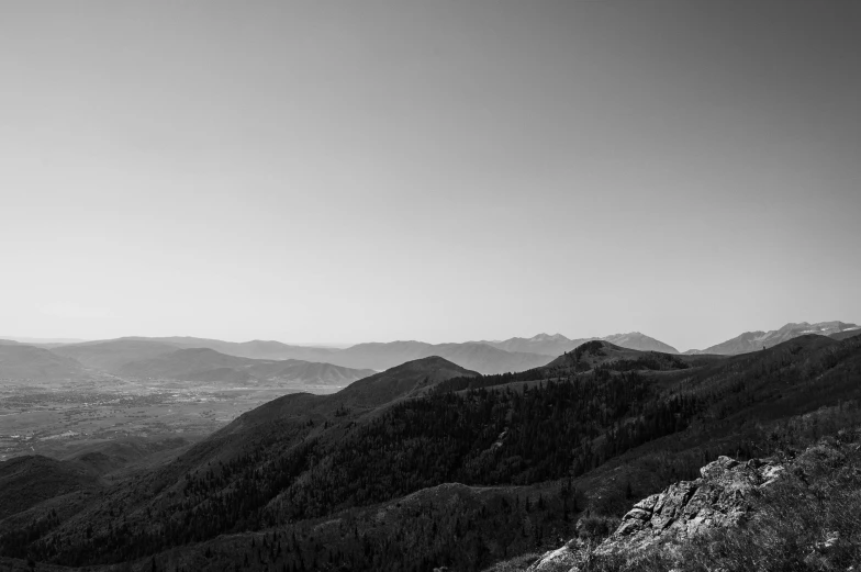 the view from the top of the mountain towards the city