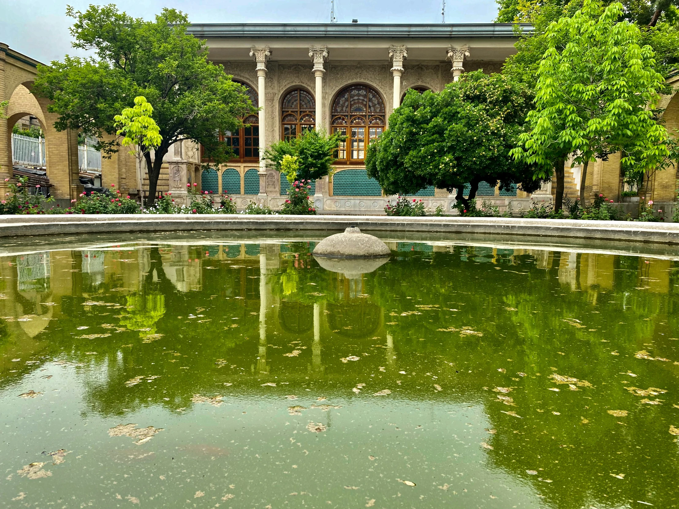 a fountain has been planted by the building