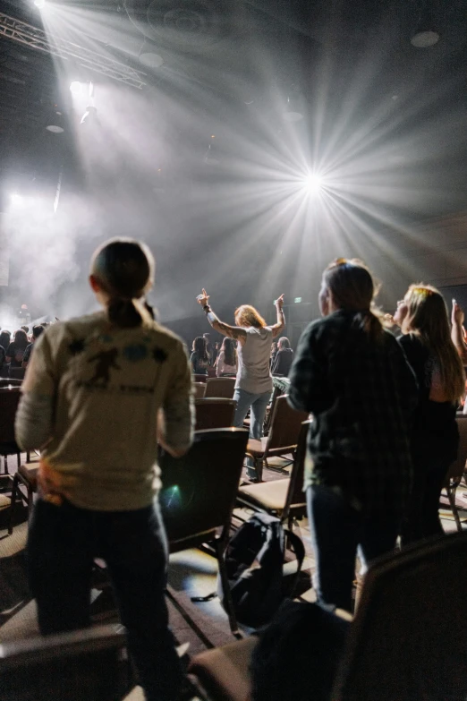 a couple of people in the middle of a stage