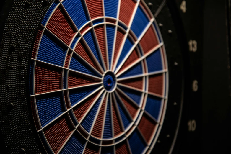 the close up view of a dart's board