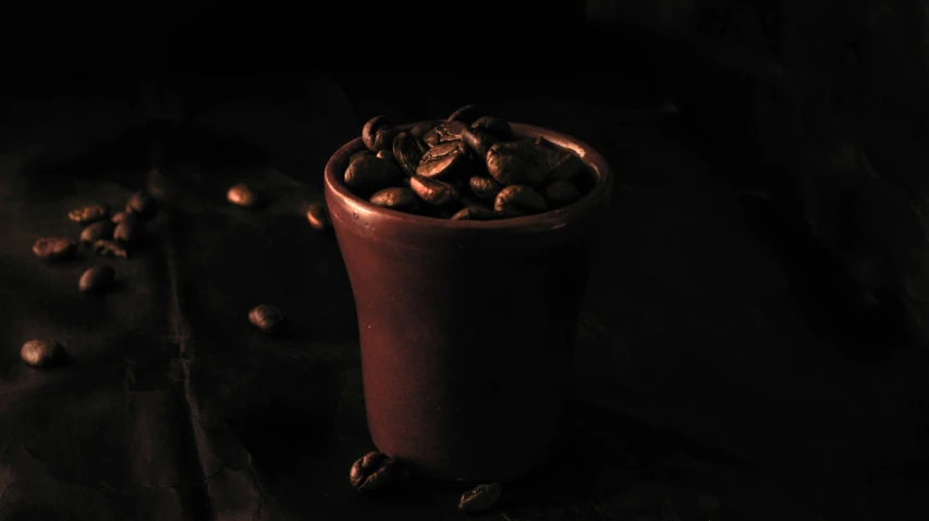 an empty chocolate cup with nuts in it